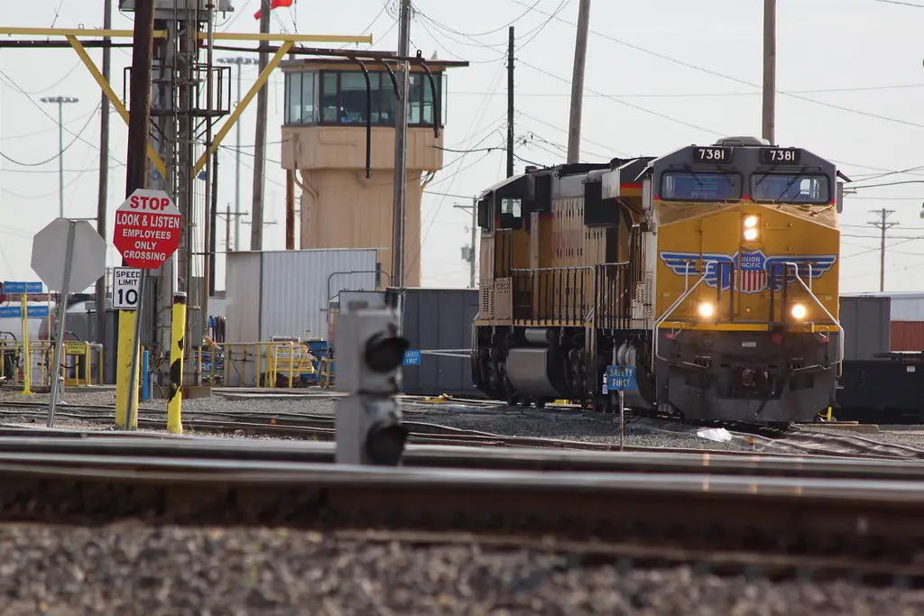 Union Pacific diesel locomotives at a rail yard fueling rack
