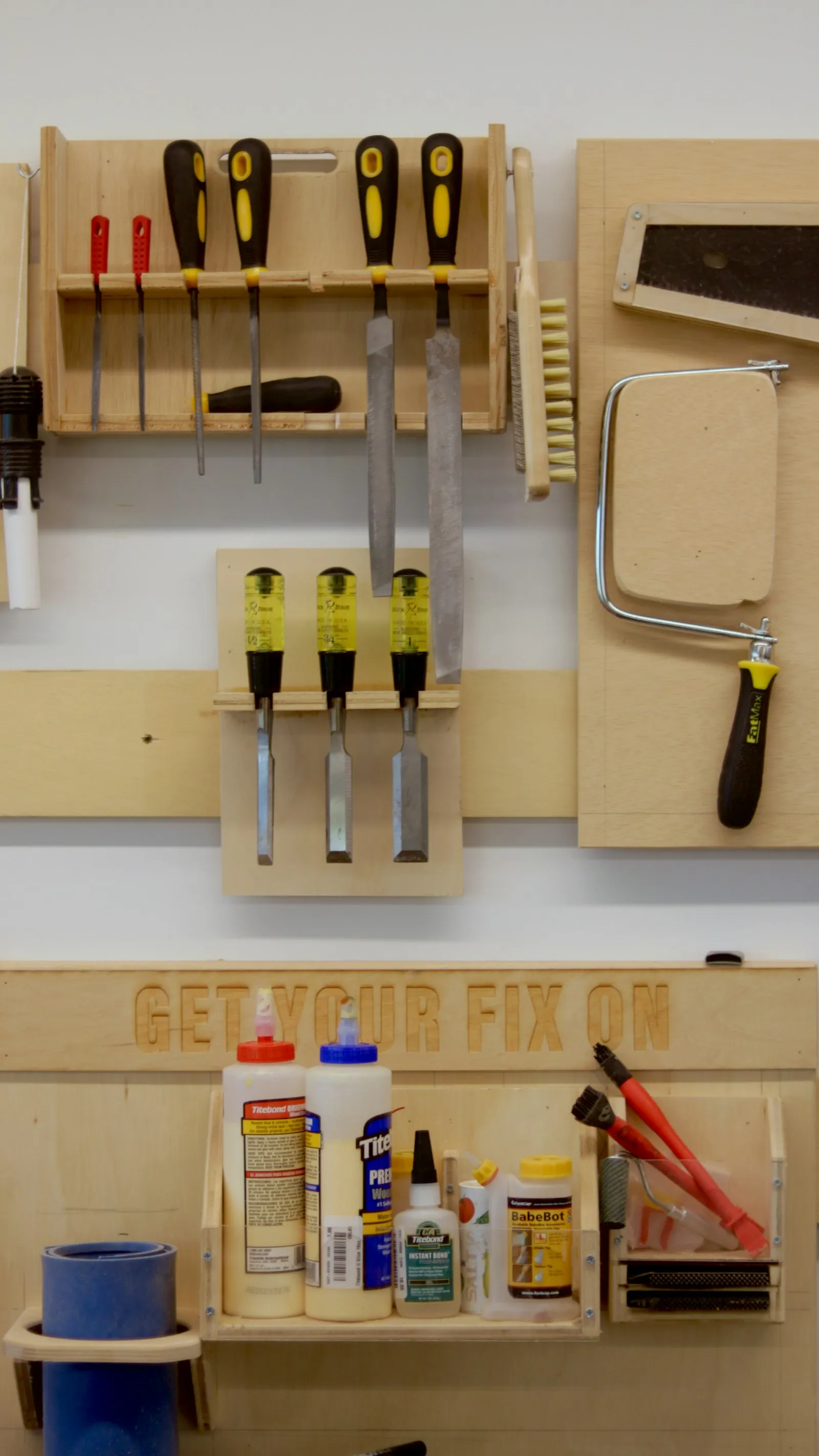Workbench with hand tools — the DIY workspace where every train horn build happens