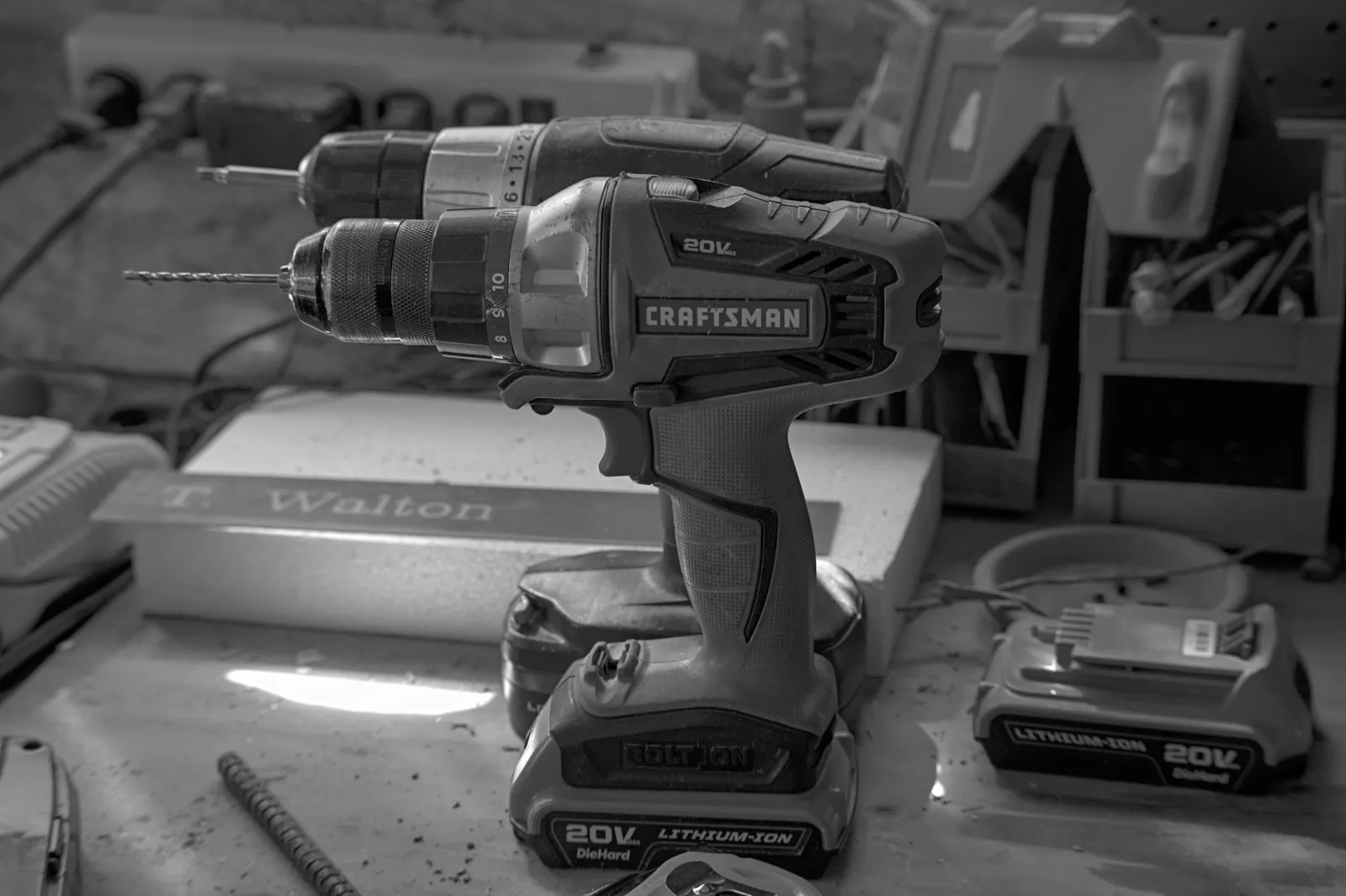 Workbench with hand tools — the workshop setup for a drill-pump DIY train horn build