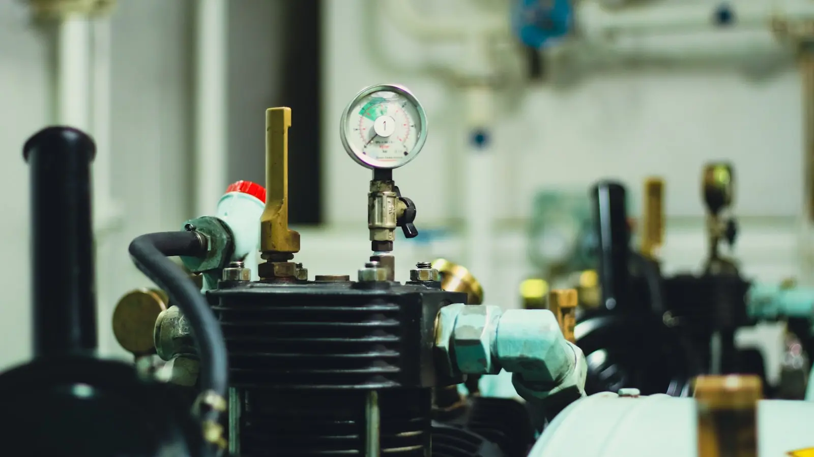 Air compressor close-up — duty cycle determines how long it can run continuously