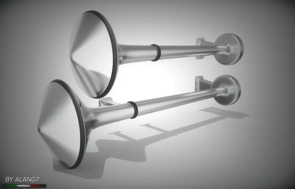 Chrome dual air horns mounted on a truck
