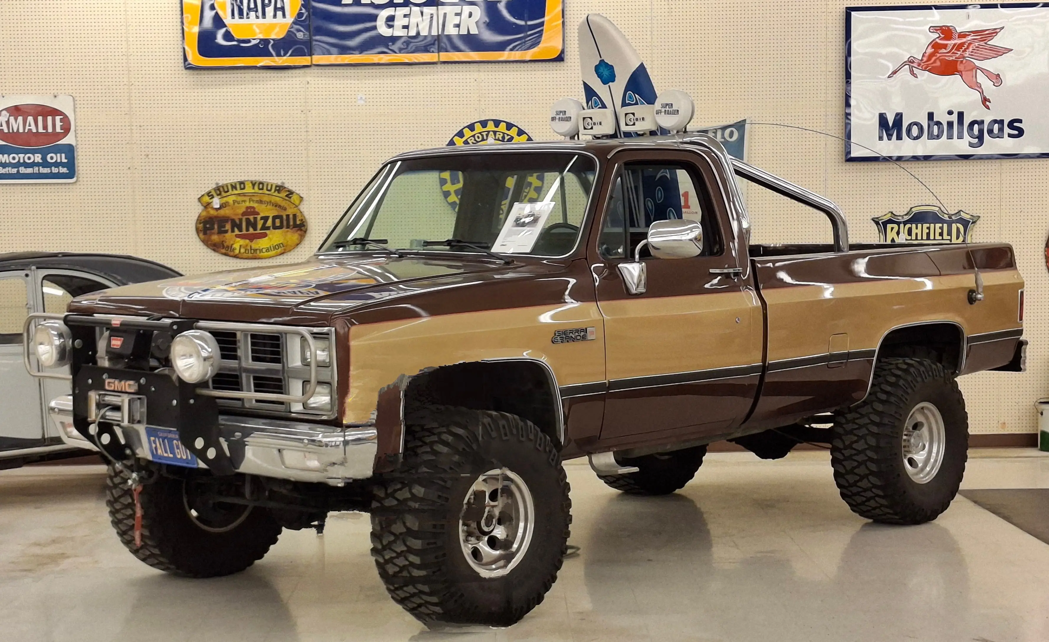 Lifted GMC pickup truck of the type commonly fitted with aftermarket train horn kits