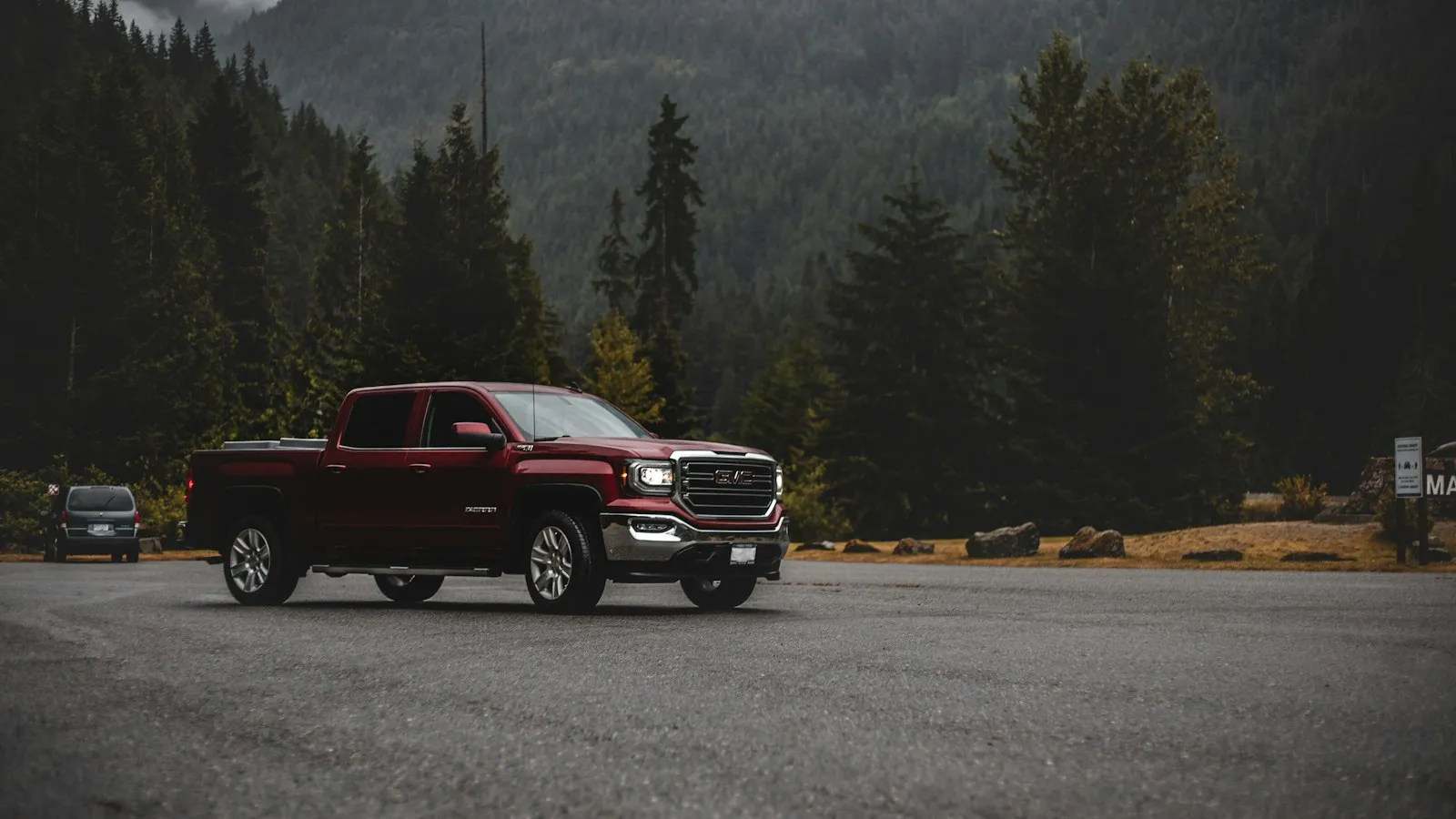 Red padded theater chairs — cinema setting where train horns appear in soundtrack and on-screen