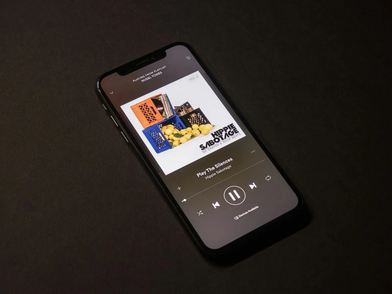 Smartphone showing a music streaming app — the consumer-tier audio playback context for MP3 downloads