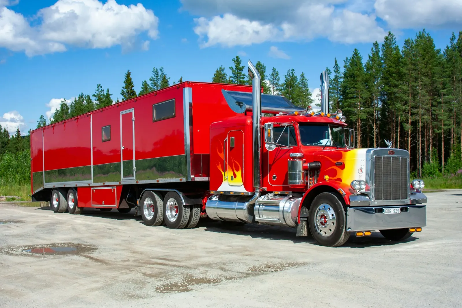 Red and white Peterbilt truck on the road — Peterbilt 379 cab-roof install context