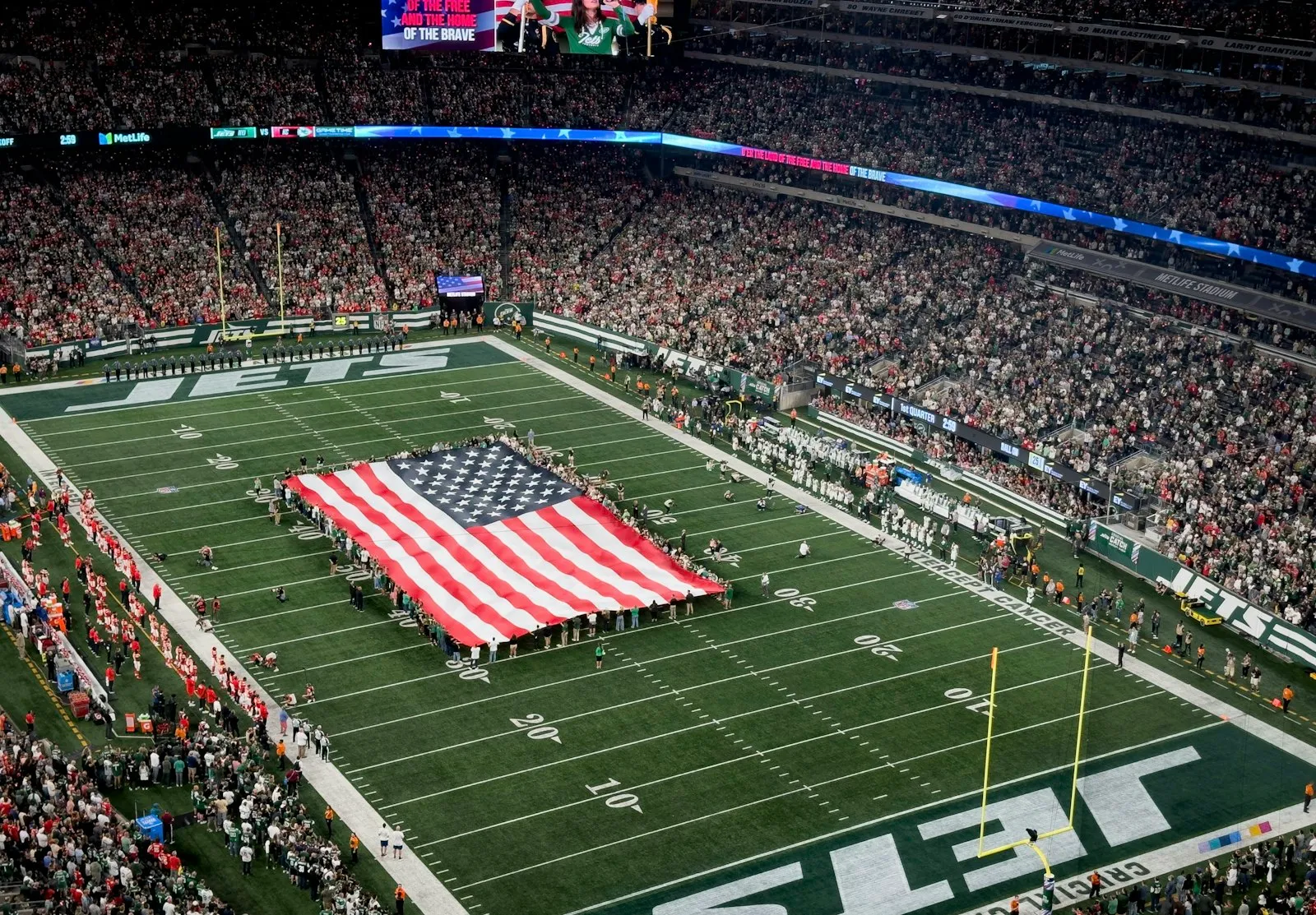 American football field with flag — Ross-Ade Stadium where the Boilermaker Special sounds