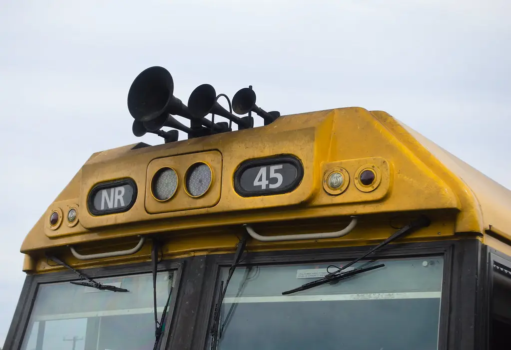 Three-chime air horn mounted on the roof of a locomotive cab