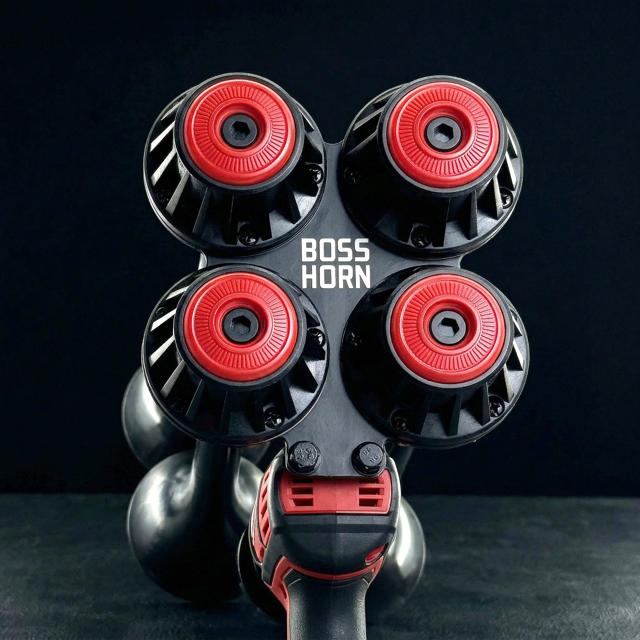 Boss Series front view showing four red-capped trumpet drivers and BossHorn badge